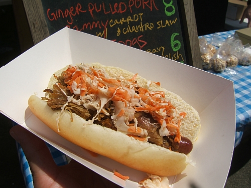 Alobar’s big dog topped with ginger pulled pork and carrot slaw.