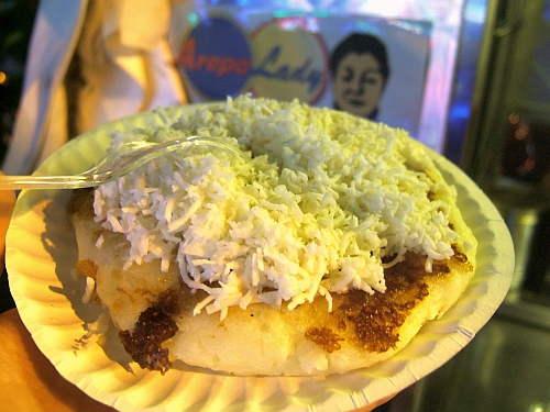 An arepa de queso in all its gooey griddled glory. 