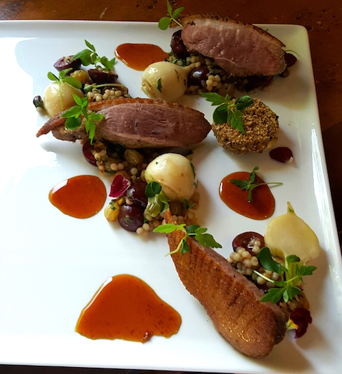 Crescent Grill's duka spice duck features a puck of pistachio crusted offal. 